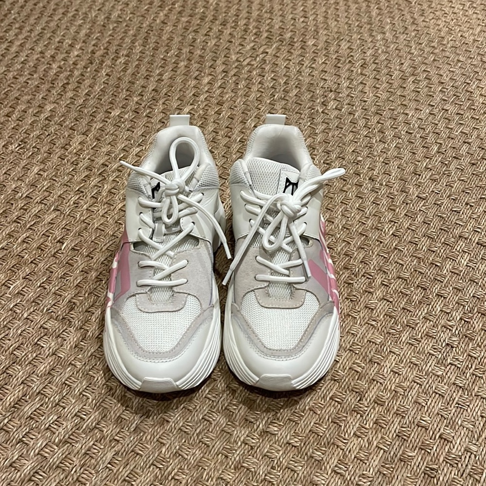 Naked Wolfe shoes.